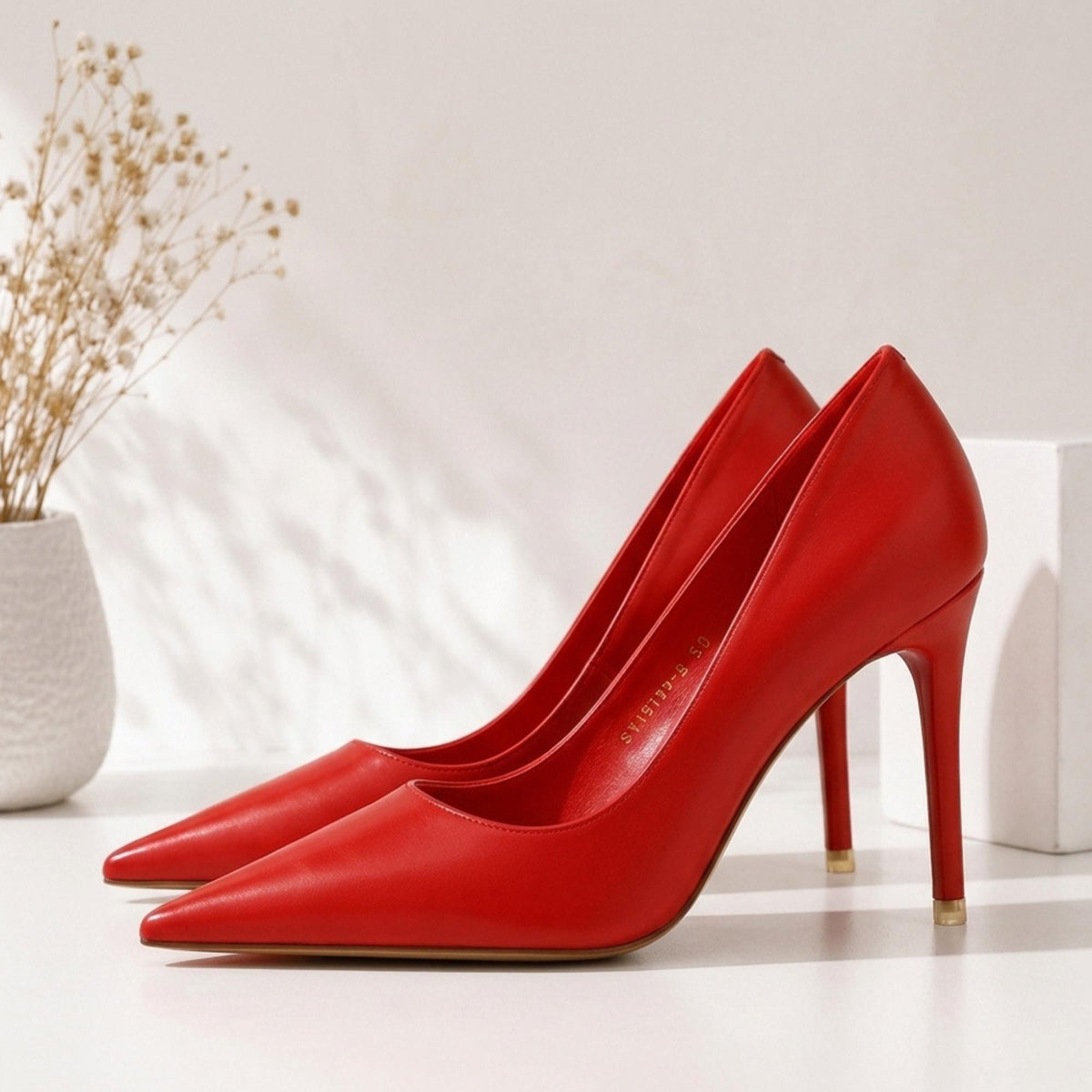 L'Escarpin Rouge