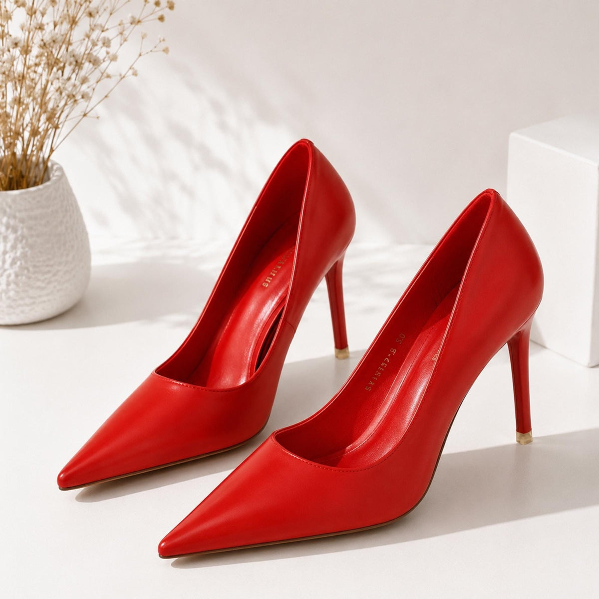 L'Escarpin Rouge